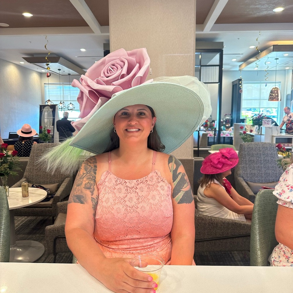 Chic Pastel Green Hat with Pink Floral Accent